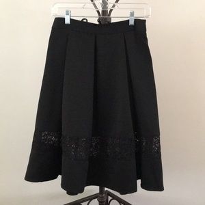 Express black lace cutout midi skirt sz 4